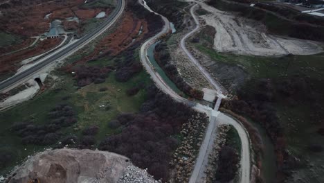 Awesome-Aerial-view-of-Jordan-River-and-Railway-in-Bluffdale-Utah,-Going-Forward-and-Tilt-Up-Movement