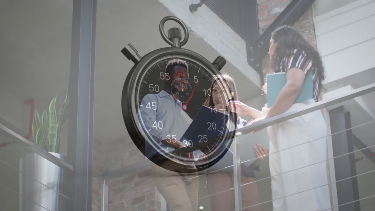 Large stopwatch animation over diverse business people discussing on balcony