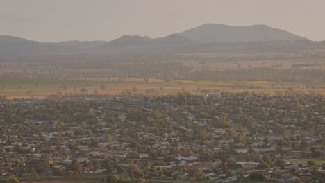 medium shot of houses and businesses in tamworth, viewed from oxley scenic lookout, new south wales, australia