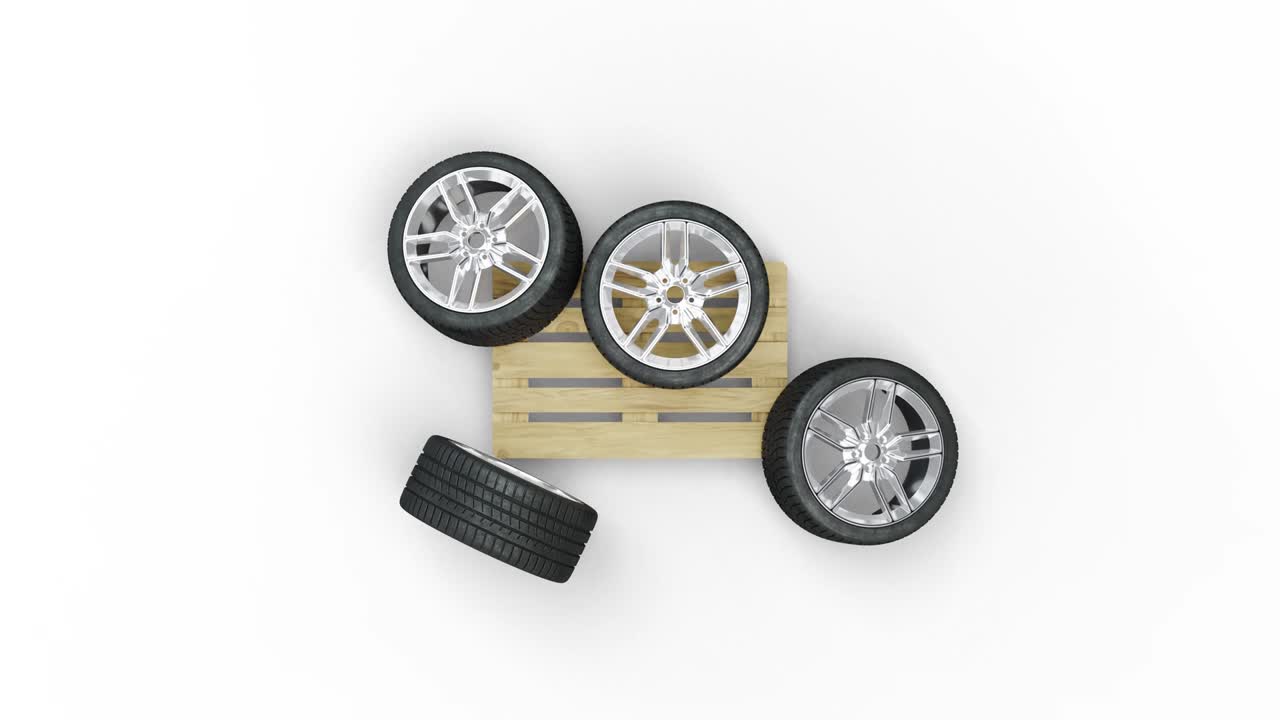 Top view and turning around of Sport Wheels put messy on a wood pallet