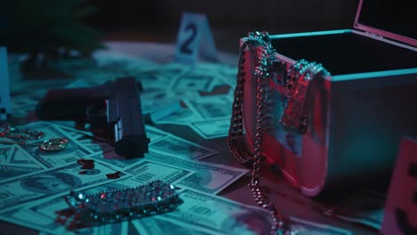 closeup shot of the table with evidence numbers jewellery gun and blood on the money bills in the crime scene creative concept closeup shot of the table in the dark apartment with signs of murder money bills with blood handgun and jewellery with evidence numbers laying on the table