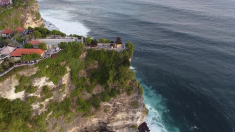 hindu temple uluwatu on a steep coastal cliff in the indonesian island bali