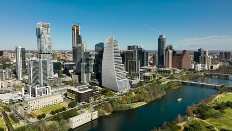 Aerial-shot-of-downtown-Austin,-TX-with-the-Colorado-River-in-frame