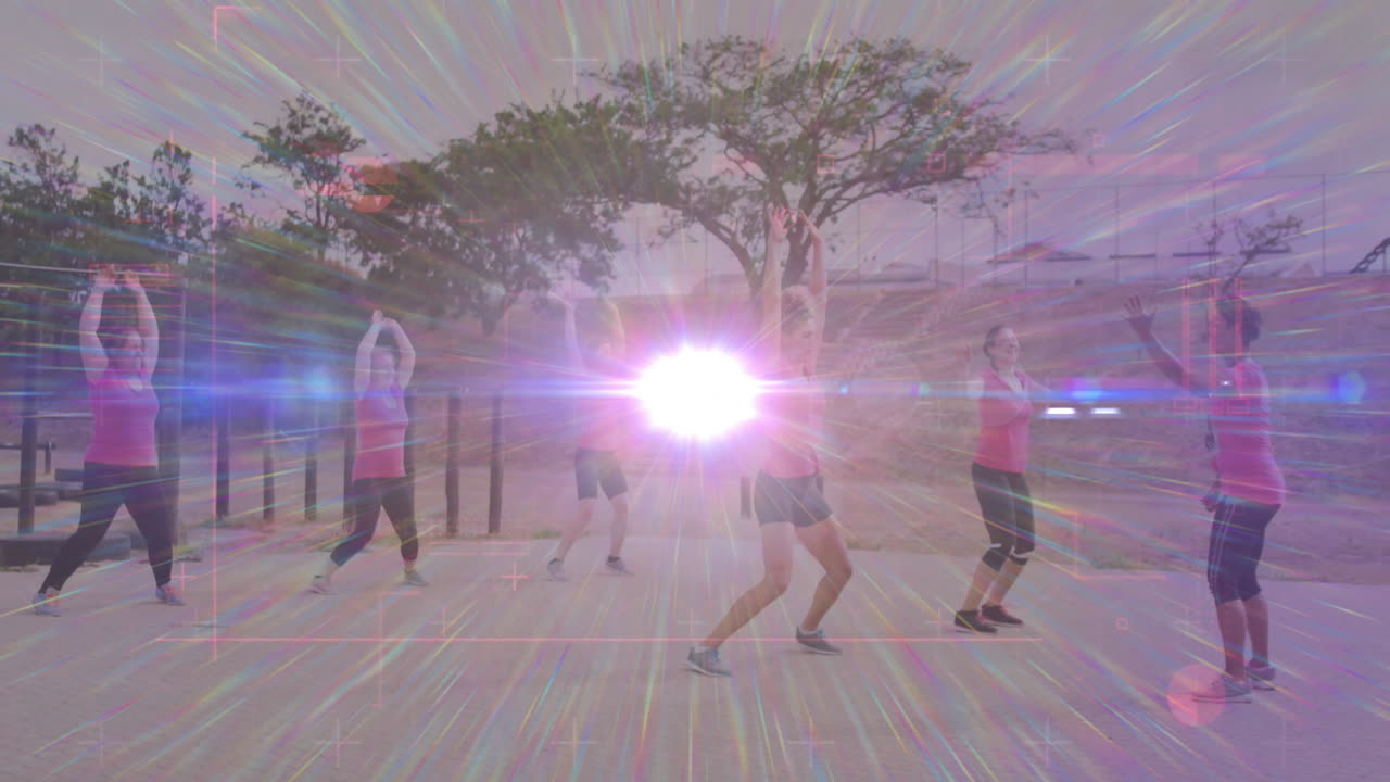 Group of people exercising outdoors with colorful light burst animation