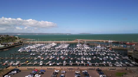 Aerial-overhead-shot-moving-towards-Bangor-Marina,-Northern-Ireland-on-a-sunny-day