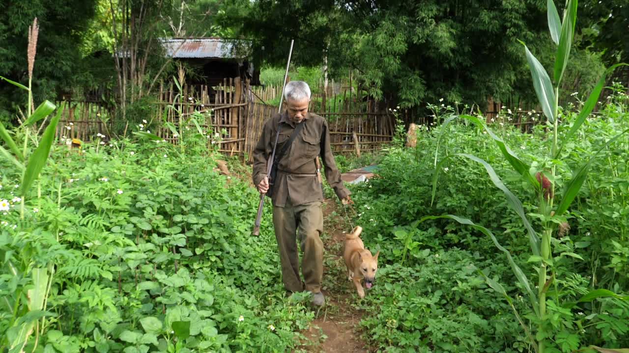 Hunter Goes With His Dog Through The Hunting