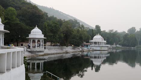 artistic city architecture with clam lake water reflection at morning video is taken at udaipur rajasthan india on nov 25 2023.