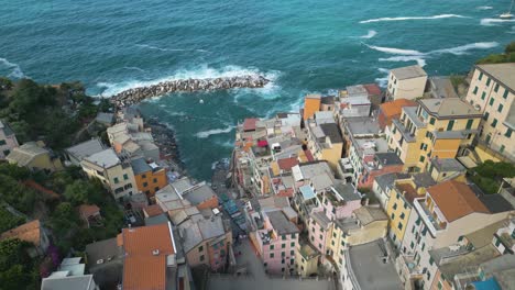 Birds-Eye-View-of-Breakwater-at-Riomaggiore-Coastline-in-Cinque-Terre