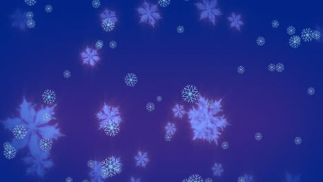 Animation-of-snowflakes-icons-falling-over-blue-background-with-copy-space