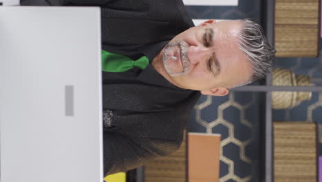 vertical video of bored and restless businessman.