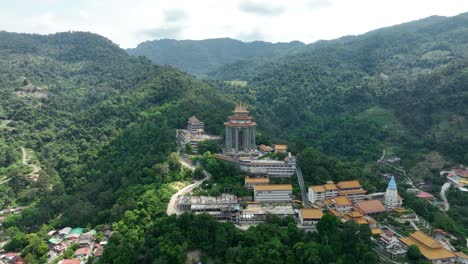 kek lok si temple, surrounded by lush greenery in penang, malaysia, aerial view