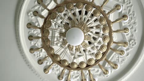 chandelier that hangs in the concert hall.