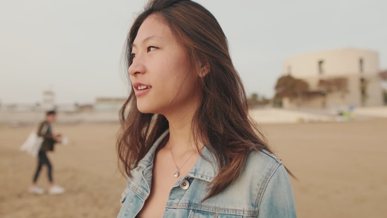 Asian woman on the beach
