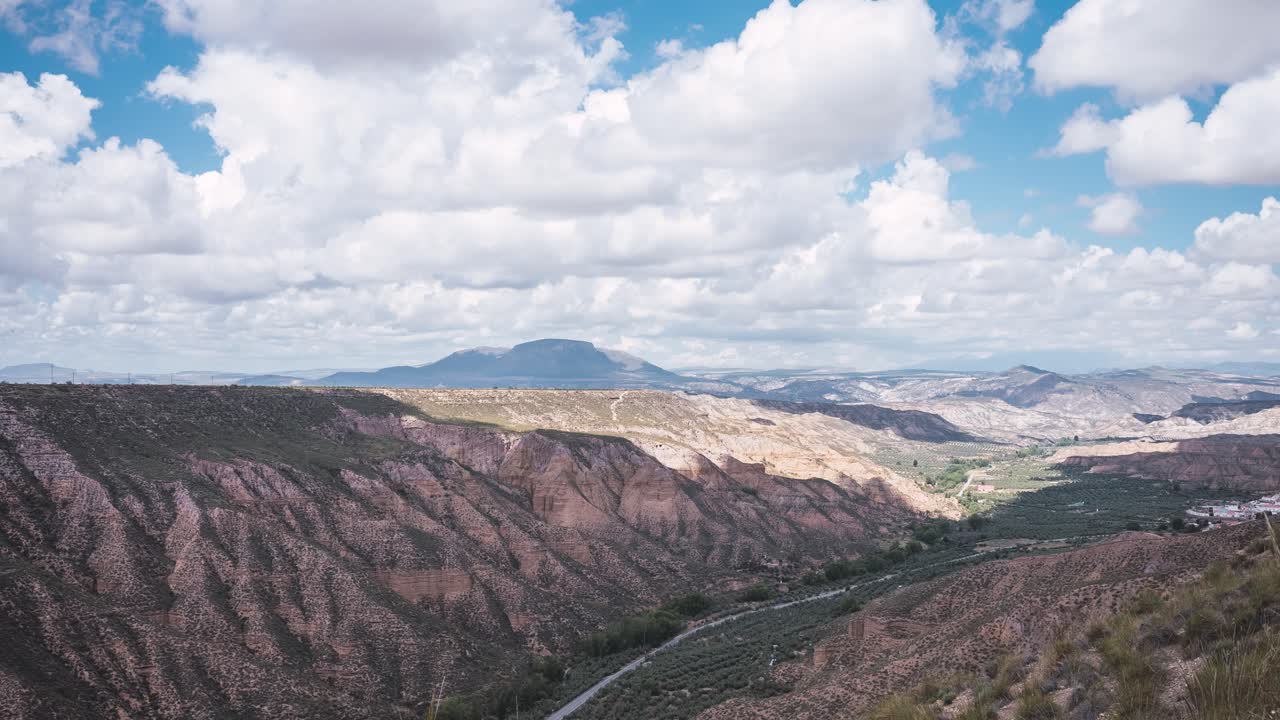 Clouds moving over Gorafe desert canyon in Granada