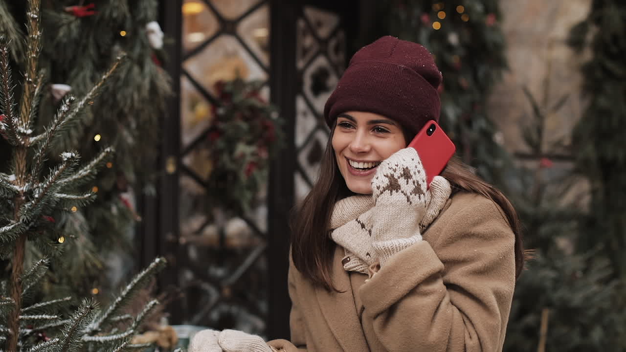 Woman talking on the phone during winter