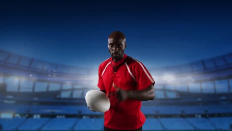 Professional-rugby-player-standing-in-front-of-a-stadium