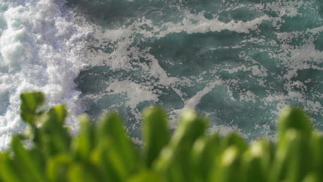 slow motion of tropical ocean waves crashing, swirling and foaming