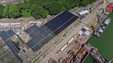 aerial view of tusen wan slaughterhouse with a lot of solar panels on top of the building