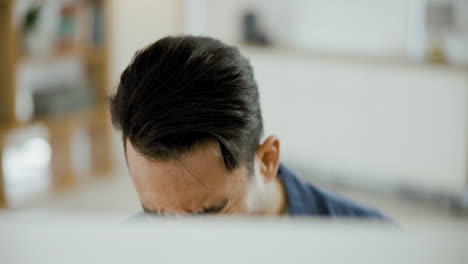 stressed man at computer