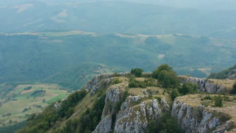 Aerial:-amazing-mountainside-overlooking-river-valley