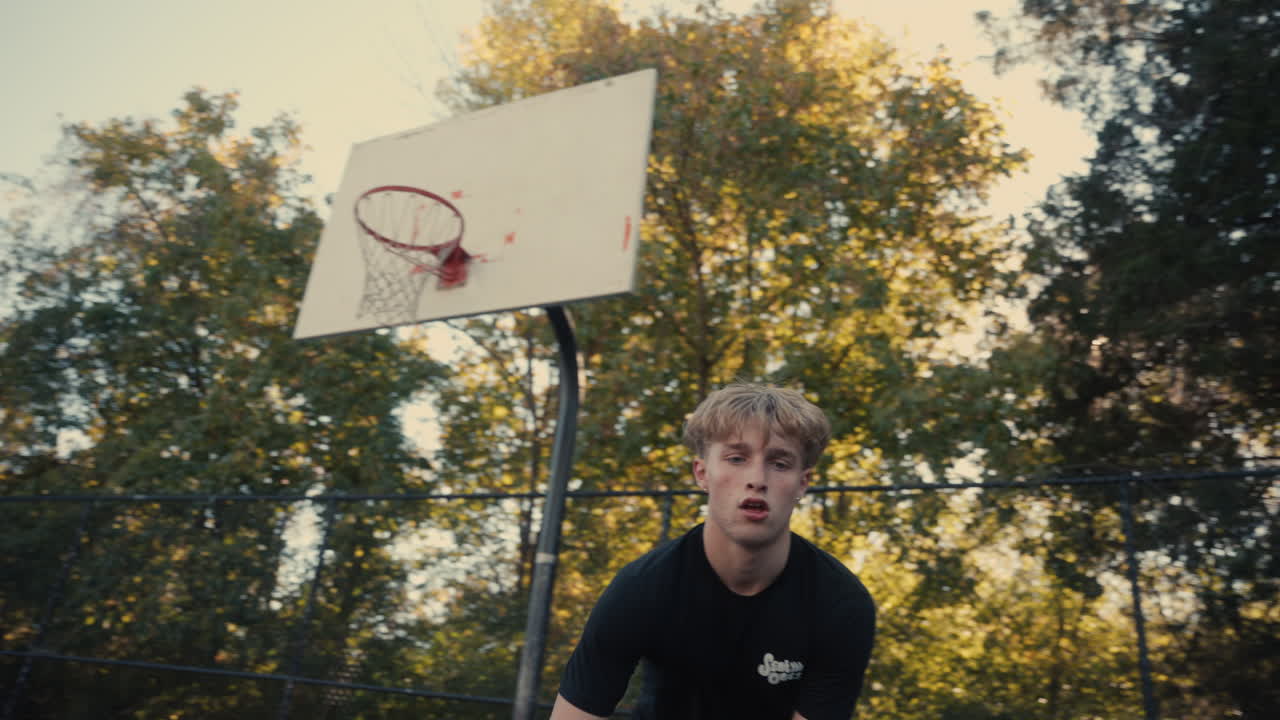 Young Man Posing for Basketball Photo