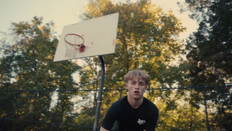 Young Man Posing for Basketball Photo