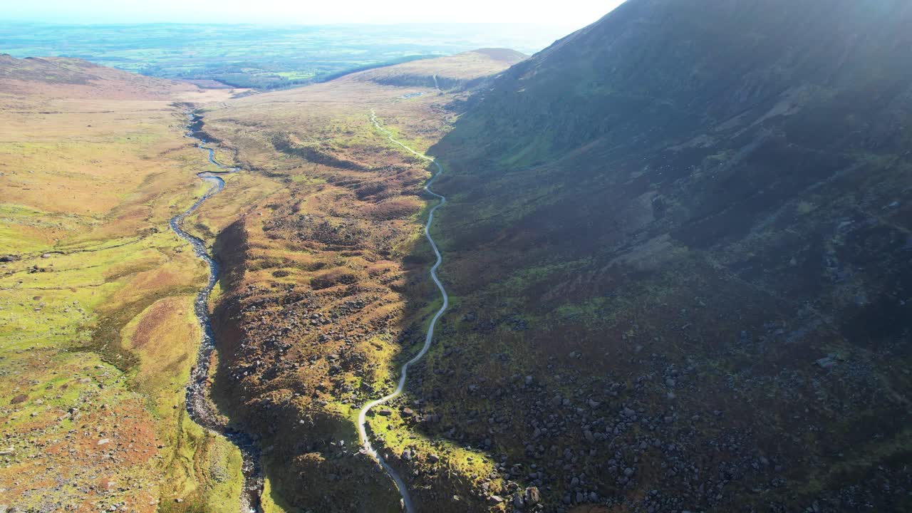 Ireland Mountains drone flying down Mahon valley over trail and Mahon river Epic Landscapes Comeragh Mountains Waterford