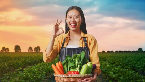 happy farmer holding basket of fresh vegetables