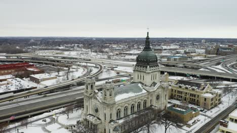 aerial orbiting shot approaching the basilica of saint mary church, minneapolis