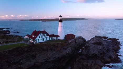 great aerial shot over the portland head lighthouse suggests americana or beautiful new england scenery