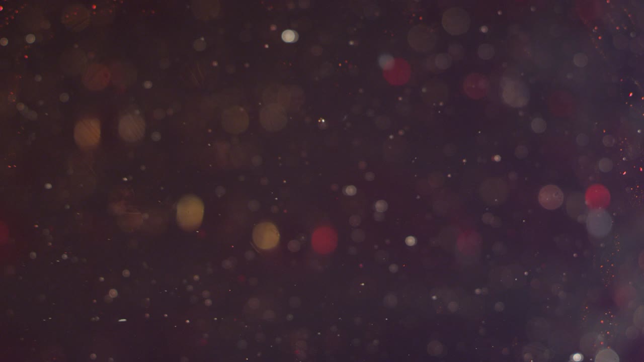 explotando y expandiendo partículas de galaxia roja fondo de textura abstracta