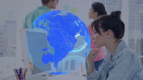 animation of global network and clock on scanner processing data over smiling woman at office