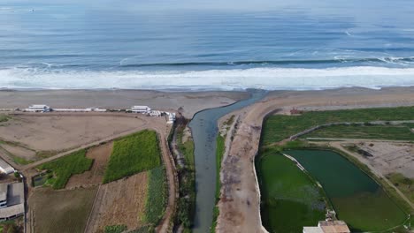 Fresh-water-river-mouth-emptying-into-the-ocean