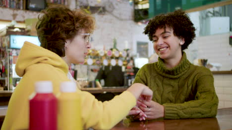 lesbian couple in a bar