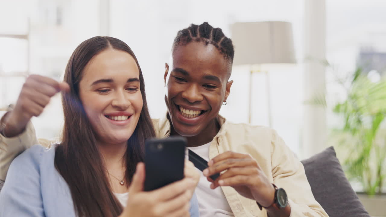 Phone, couple and credit card for online shopping