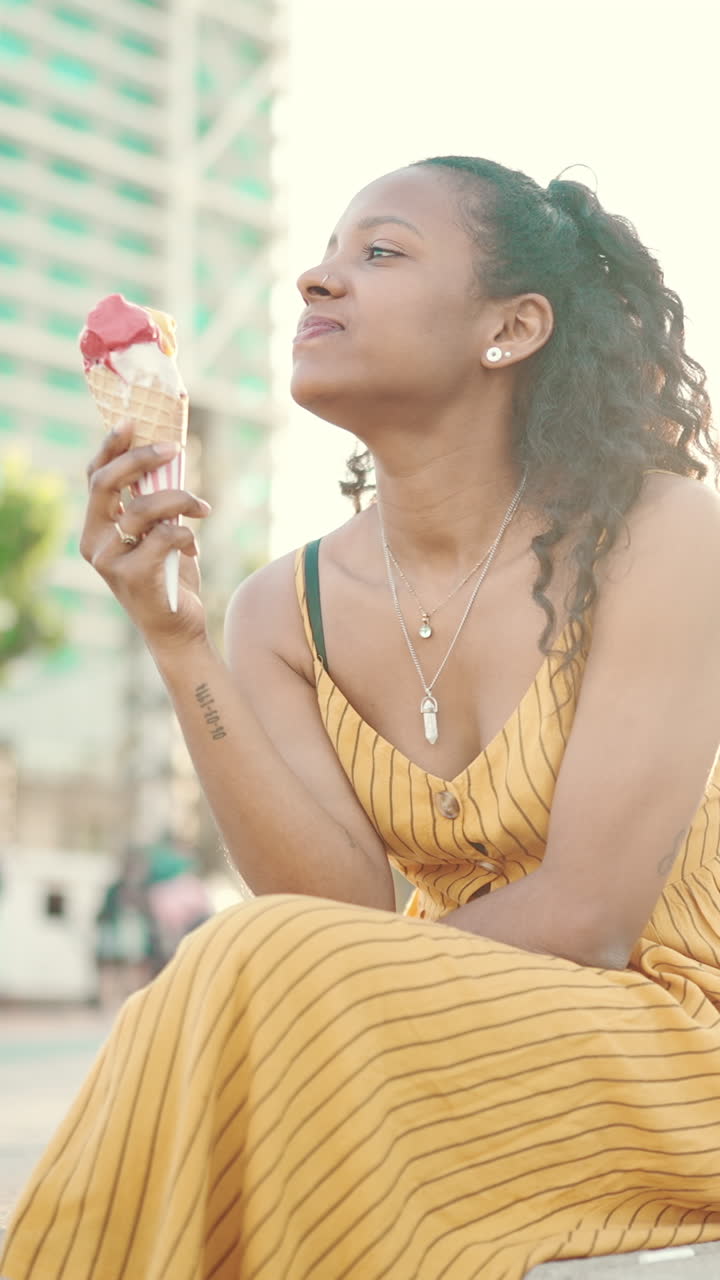 Woman enjoying ice cream on a sunny day