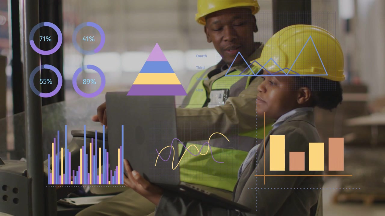 Woman raising tablet displaying warehouse charts for ops review, man leaning and pointing at screen