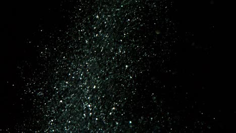 el fondo abstracto con brillantes chispas doradas las partículas de polvo brillante brillan las partículas de luz voladoras y parpadeantes el fondo negro en 4k loopable los billetes de dólar de alta calidad que caen en 4k