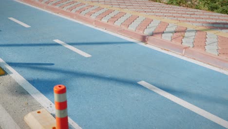 empty blue bicycle lane with cycle sign. riding on equipped bike path. zone for riding bicycles. cycling and triathlon concept. sport concept