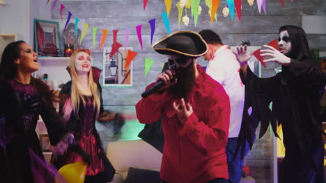 bearded pirate singing karaoke at halloween party