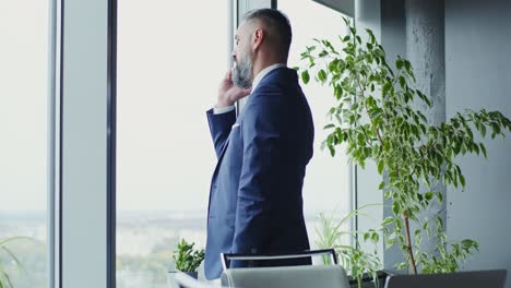businessman on phone in modern office