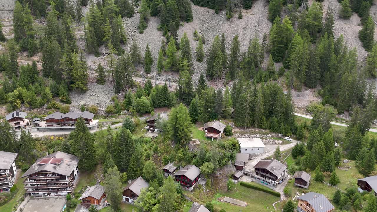 4K High resolution aerial drone video of the beautiful town of Champex Lac Switzerland one of the gems that the TMB- Tour du Mont Blanc goes through with small houses and a beautiful lake