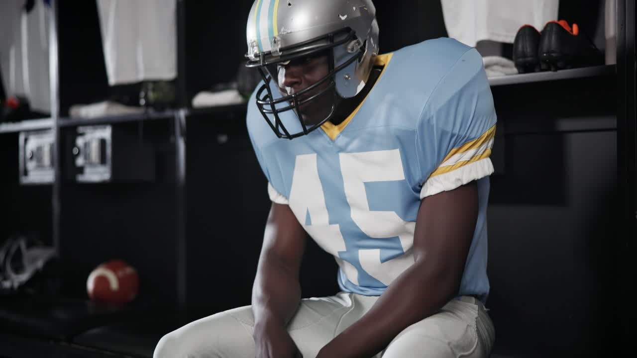 Football player in locker room