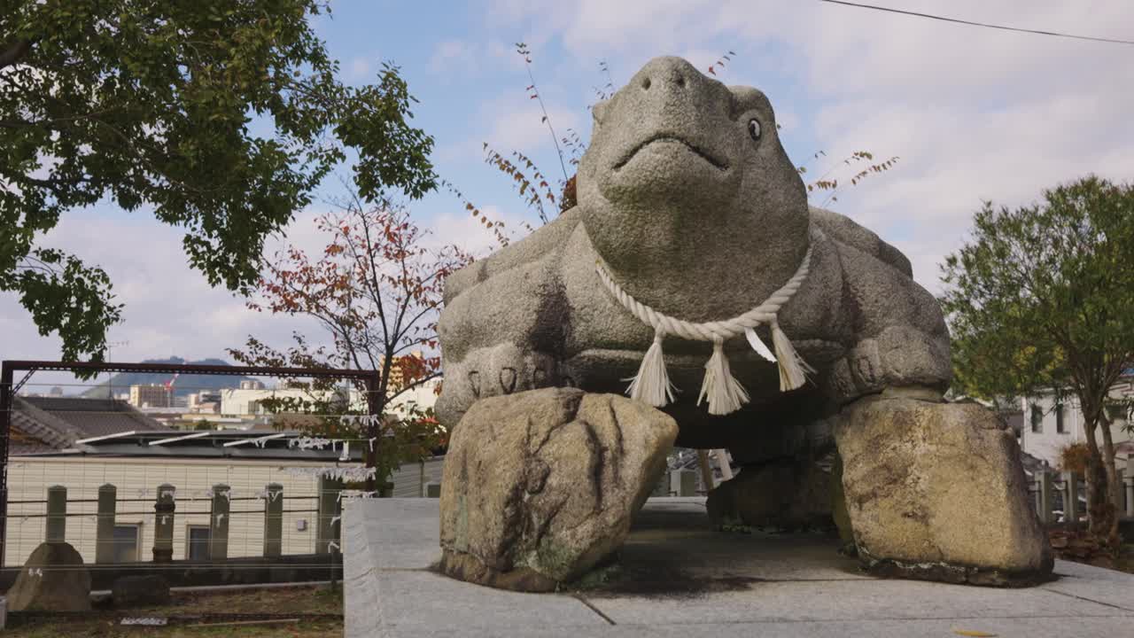 Japanese Shinto Shrine With Guardian Turtle Statue in Hiroshima