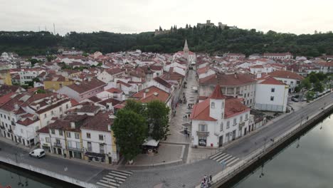 aerial view of the historic town of tomar, portugal, with river and castle