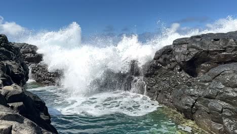 wave hit coral reef toward natural pool, pacific ocean, slow-motion