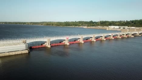 Aerial-view-of-Lock-and-Dam-14-on-the-Mississippi-River-on-a-sunny-summer-day,-near-Hampton-Illinois