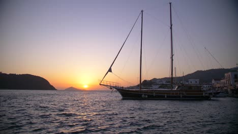old ship docked at the port in the isle of patmos in greece bible land holy christianity christian site
