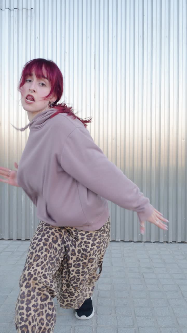 Young urban dancer performing a choreography in six movements