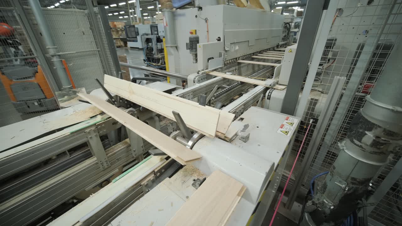 Automated Wood Planks Processing on a Conveyor Belt in a Factory